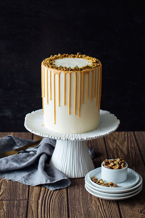 PASTEL DE CHOCOLATE/VAINILLA CON PISTACHE/ALMENDRA