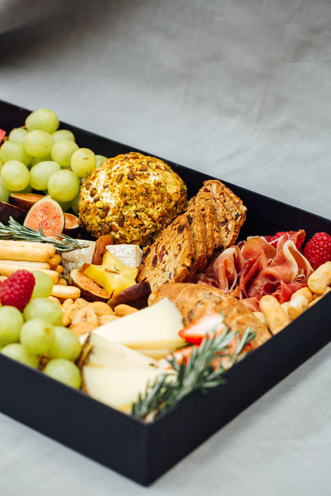 Black box with cheeses and cold meats