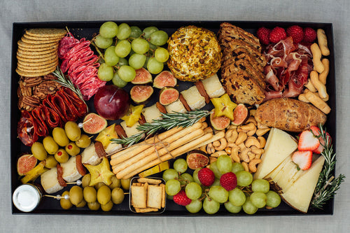 Black box with cheeses and cold meats